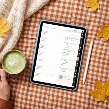 2026-2027 weekly spread on an iPad in a light blue case on gingham bedding