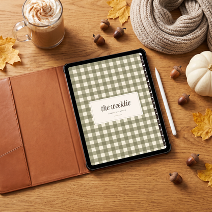 Undated digital planner olive gingham cover on an iPad in a leather case with a latte